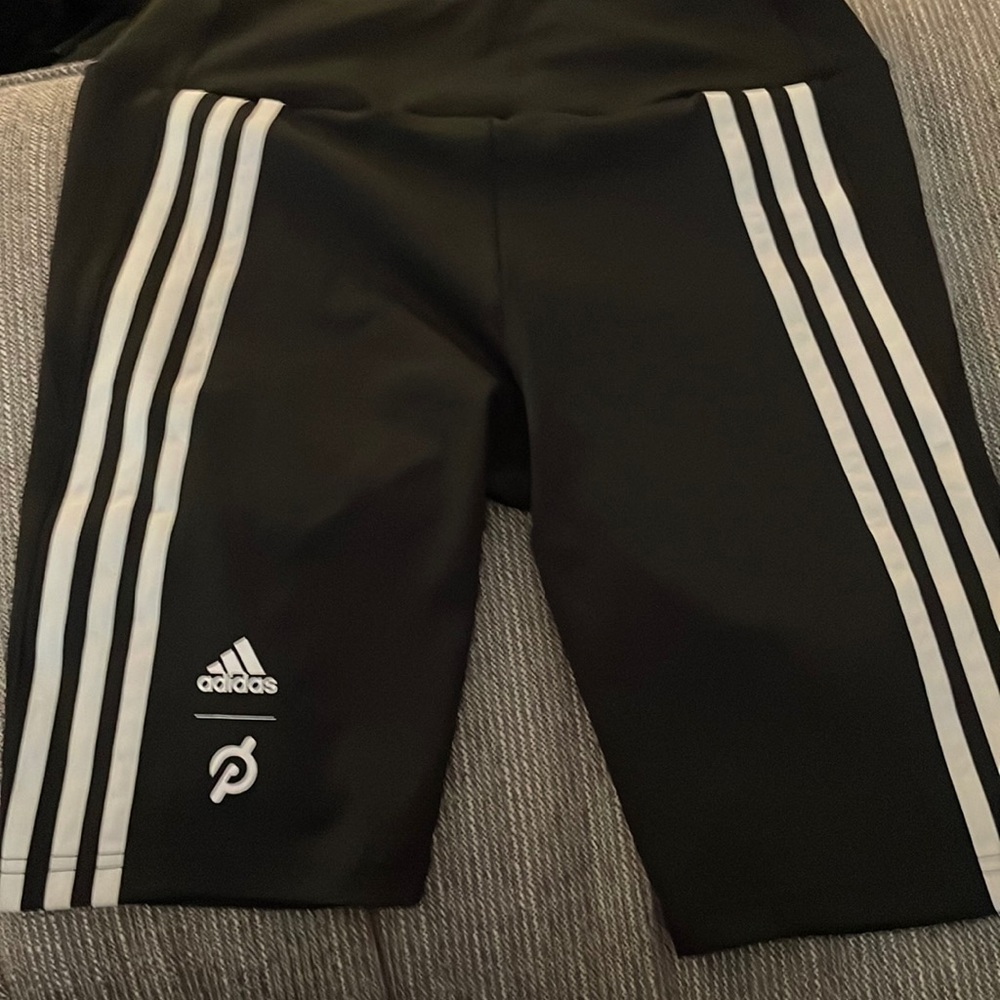 Never worn with tags peloton and adidas black and white bike shorts